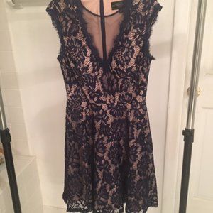 Flirty, shapely, black lacy dress